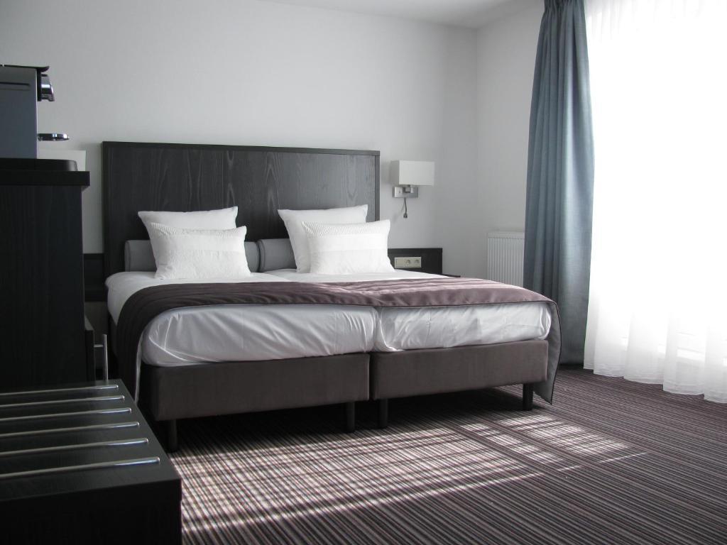 Boutique Hotel De Zwaluw De Koog  Room photo