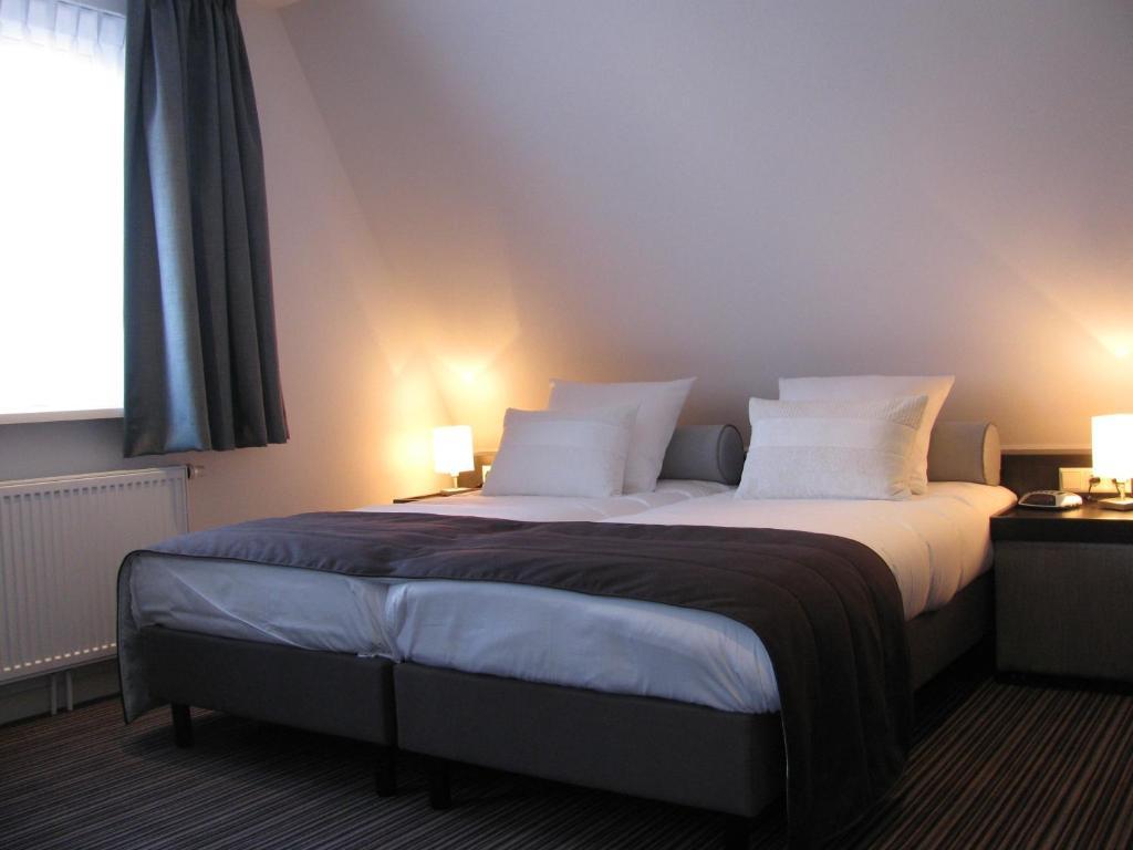 Boutique Hotel De Zwaluw De Koog  Room photo